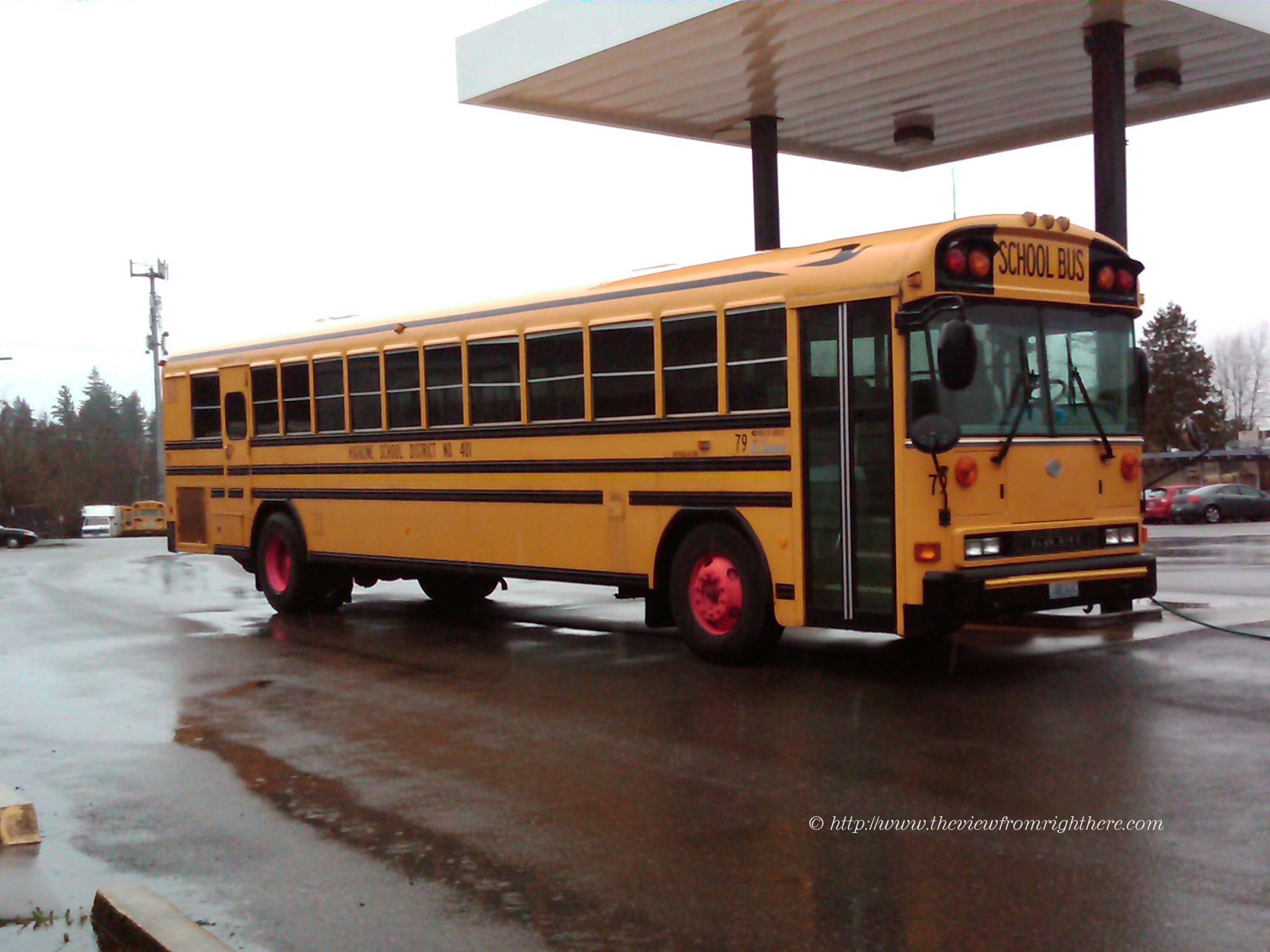 Retirees’ Last Day – School Bus with Pink Wheels