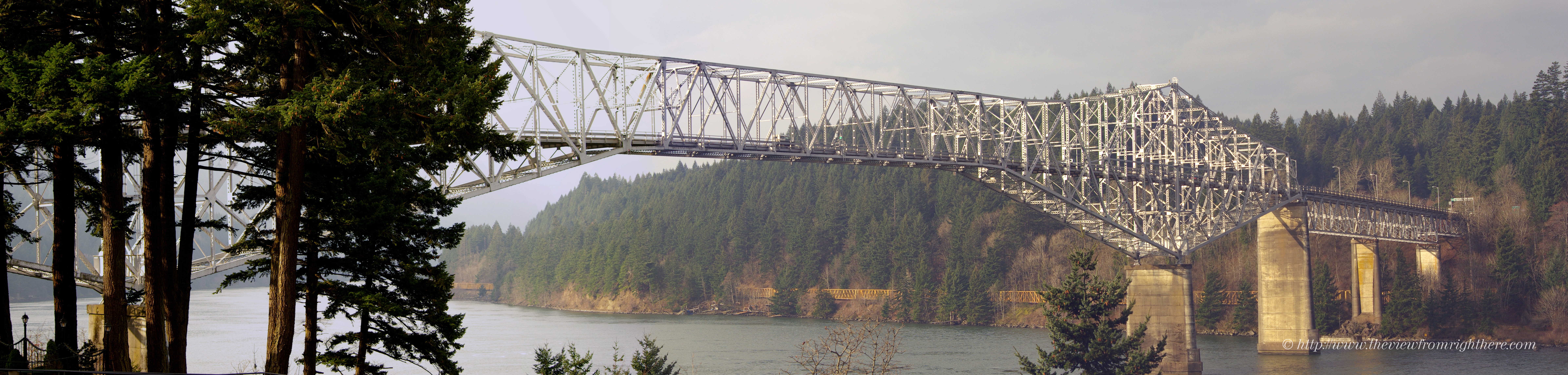 Barge Passing Under Bridge of the Gods on Columbia River at Cascade Locks