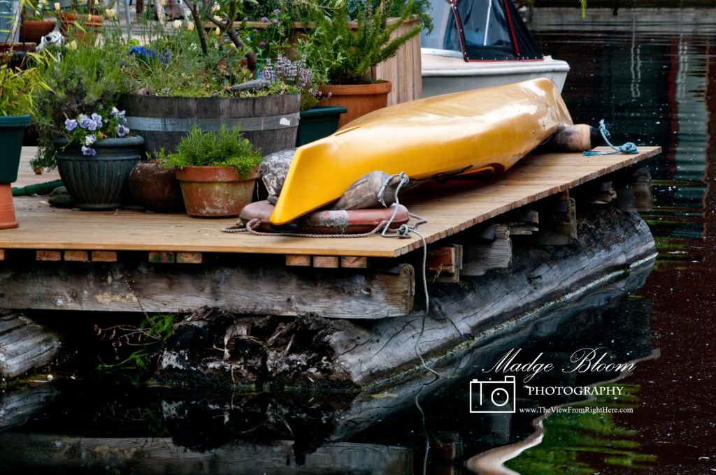 Yellow Kayak Resting on Lake Union Houseboat Deck